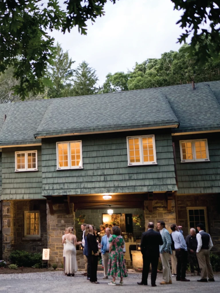 People gather outside the entrance of IntheOaks